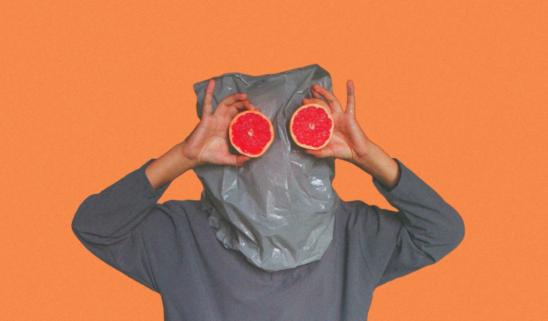person-covered-with-plastic-bag-on-head-while-holding-sliced-3317038 (1)